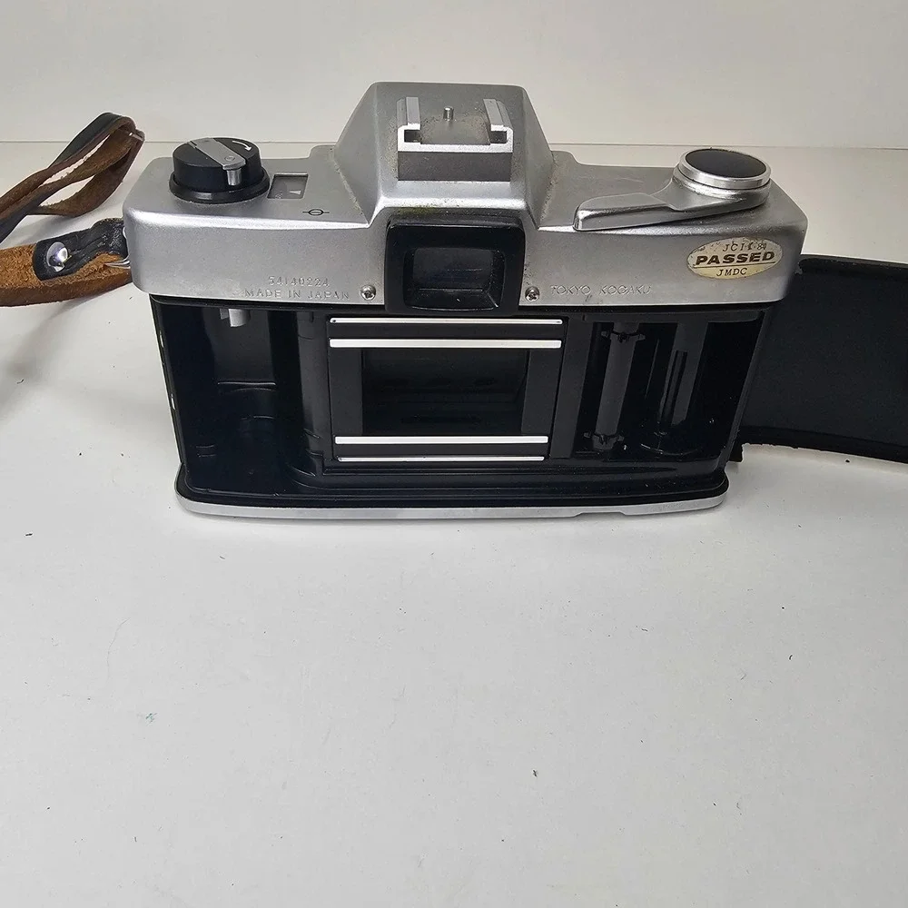 Vintage Topcon Uni 35mm SLR Camera with UV Topcor 53mm f2 Lens and Case Untested